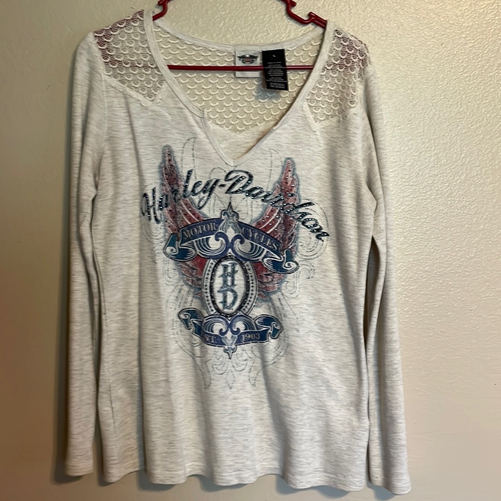 Ladies Harley Davidson long sleeve knit blouse.